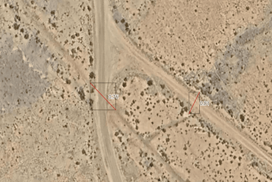 Aerial view of an irrigated field near a river